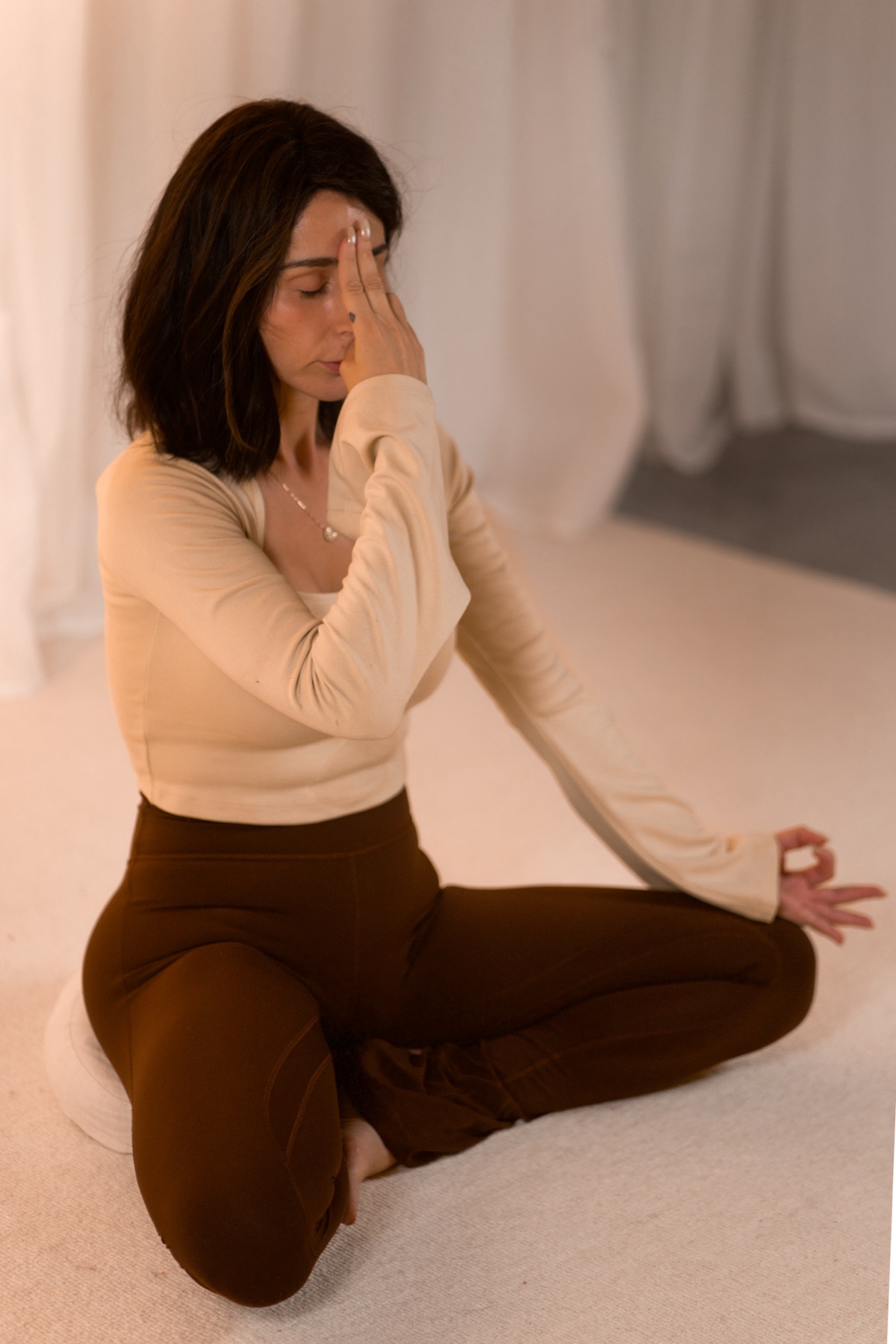 Farah in the studio, soft natural light.
